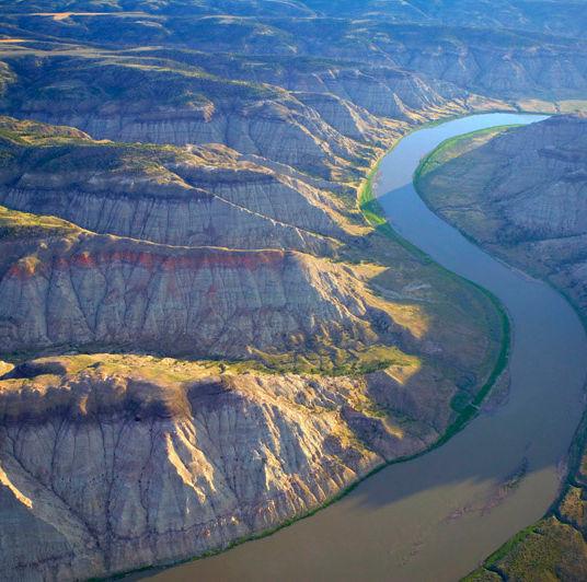 Is it the mountain that guides the water's course, or the water that sculpts the mountain's face?