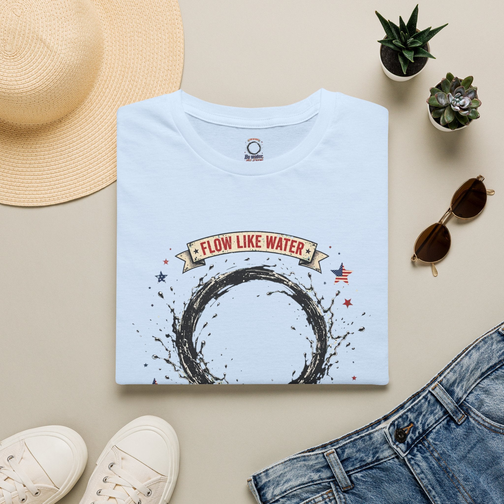 The “Be Water” Tee – Bruce Lee’s Flow Philosophy on a Retro-Inspired Shirt, Featuring FLOW LIKE WATER and 1940 Badge, Black Type on Soft Fabric